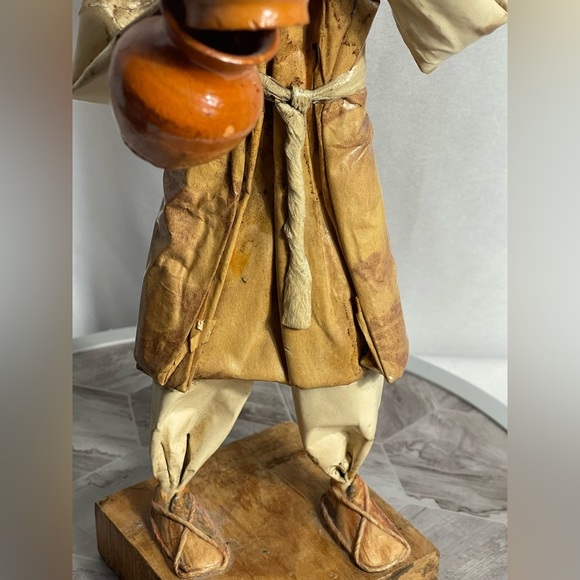 Handcrafted Artisan Figurine with Orange and Green Accents - Picture 4 of 14